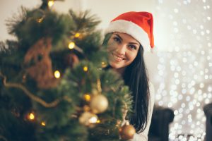 Happy woman in Santa hat