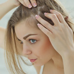 woman reviewing scalp