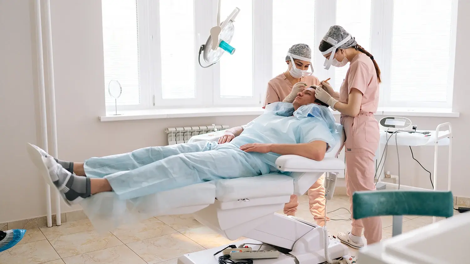 Man getting hair transplant surgery
