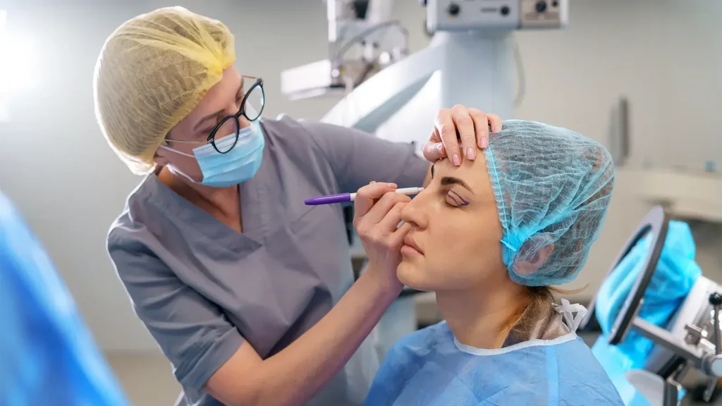 A facial plastic surgeon consulting with a patient for a blepharoplasty